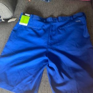 Men’s golf izod shorts. Size 38. New with tags. Royal blue flat front